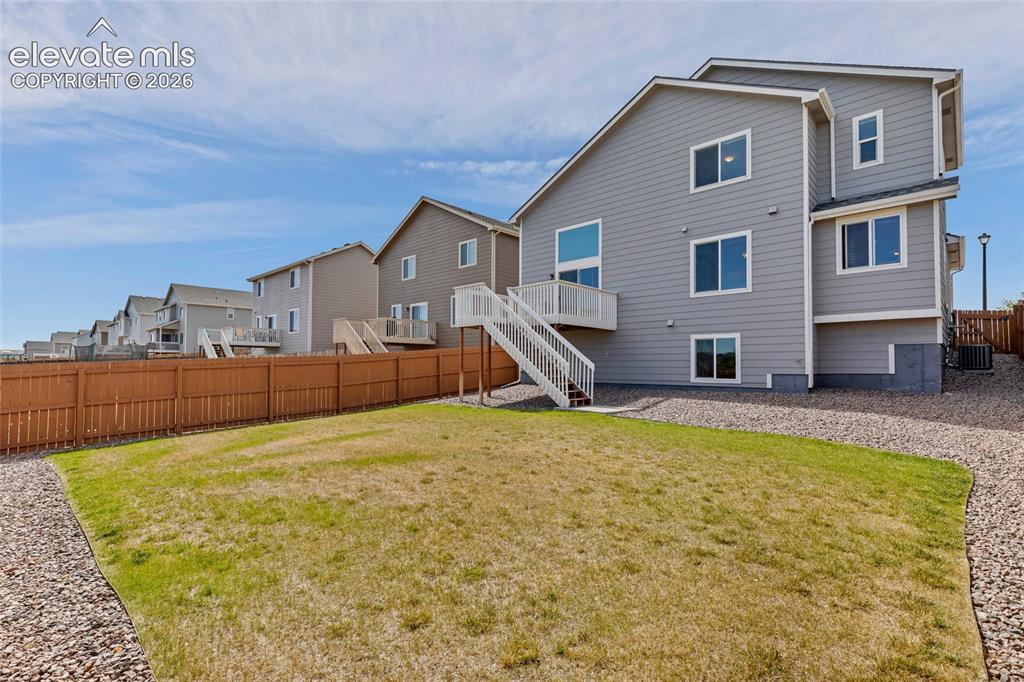 Image 37 of 38: Expansive backyard