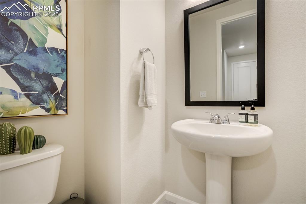 Image 15 of 50: 1/2 bath on main level