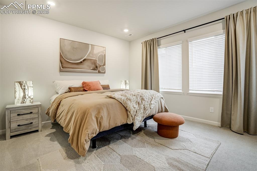 Image 19 of 50: Bedroom featuring carpet flooring and recessed lighting