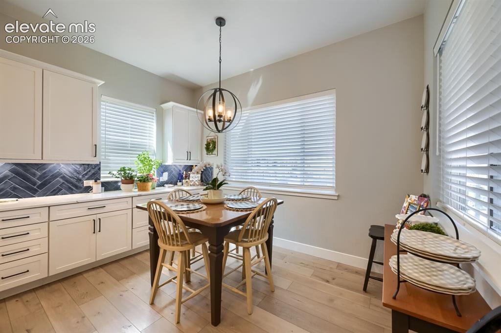Image 11 of 38: Upgraded extended countertops and cabinetry add extra work area and storage