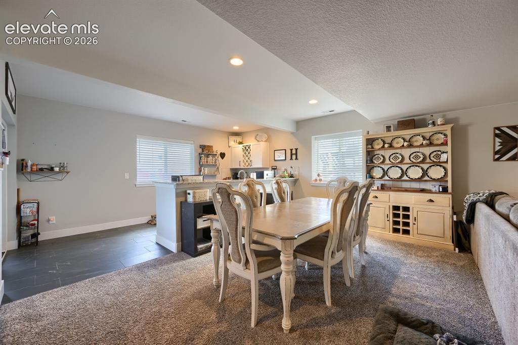 Image 27 of 38: Tenants have set up the basement for multigenerational living.