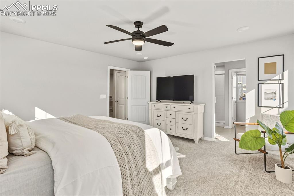 Image 17 of 37: Bedroom featuring carpet flooring and ceiling fan