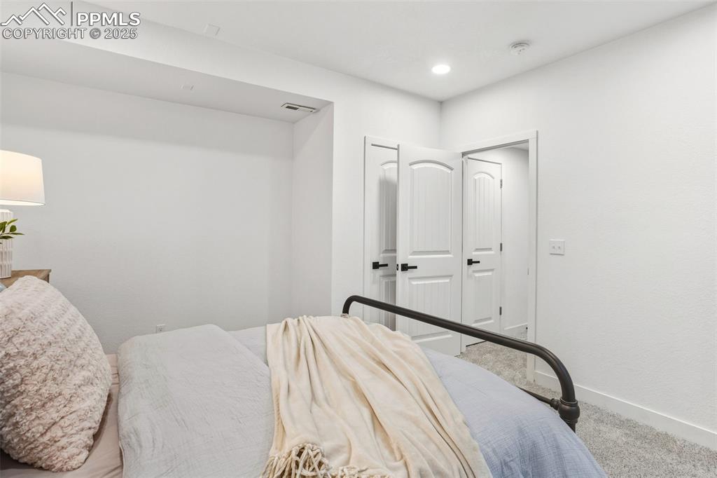 Image 32 of 37: Bedroom featuring carpet floors and recessed lighting