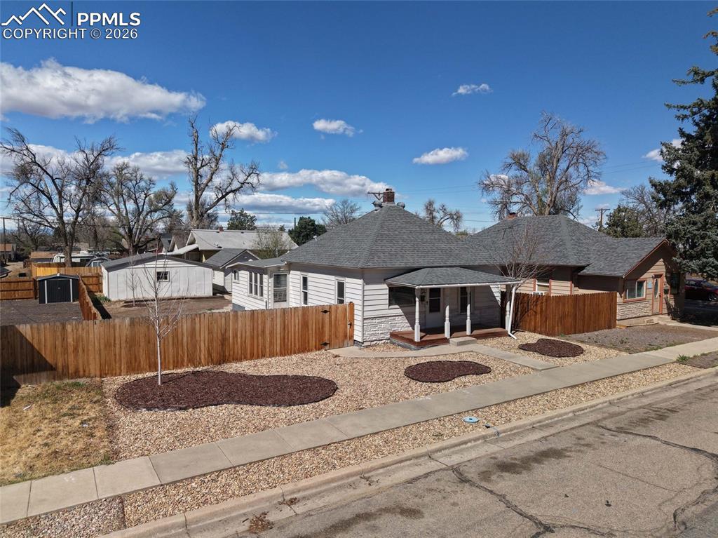 Image 2 of 40: View of front of property featuring a shingled roof