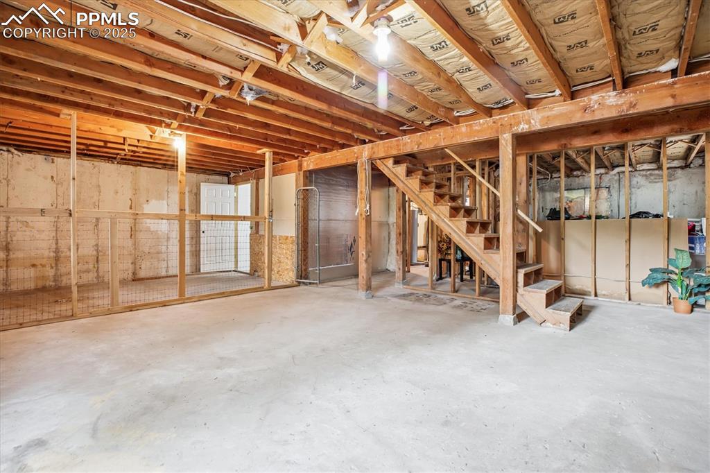 Image 21 of 29: Unfinished basement with unlimited potential