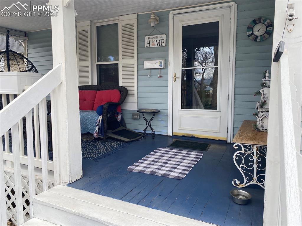 Image 3 of 36: Check out this HUGE front porch! (almost 130 sq ft)