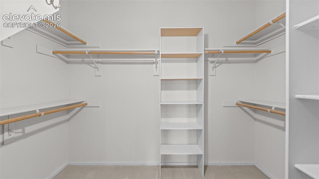 Image 15 of 28: Walk in closet