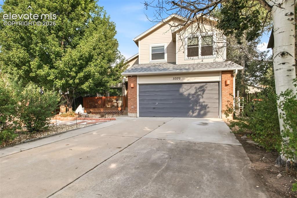 Image 1 of 41: Situated on lot to be able to view mountains from rear of home