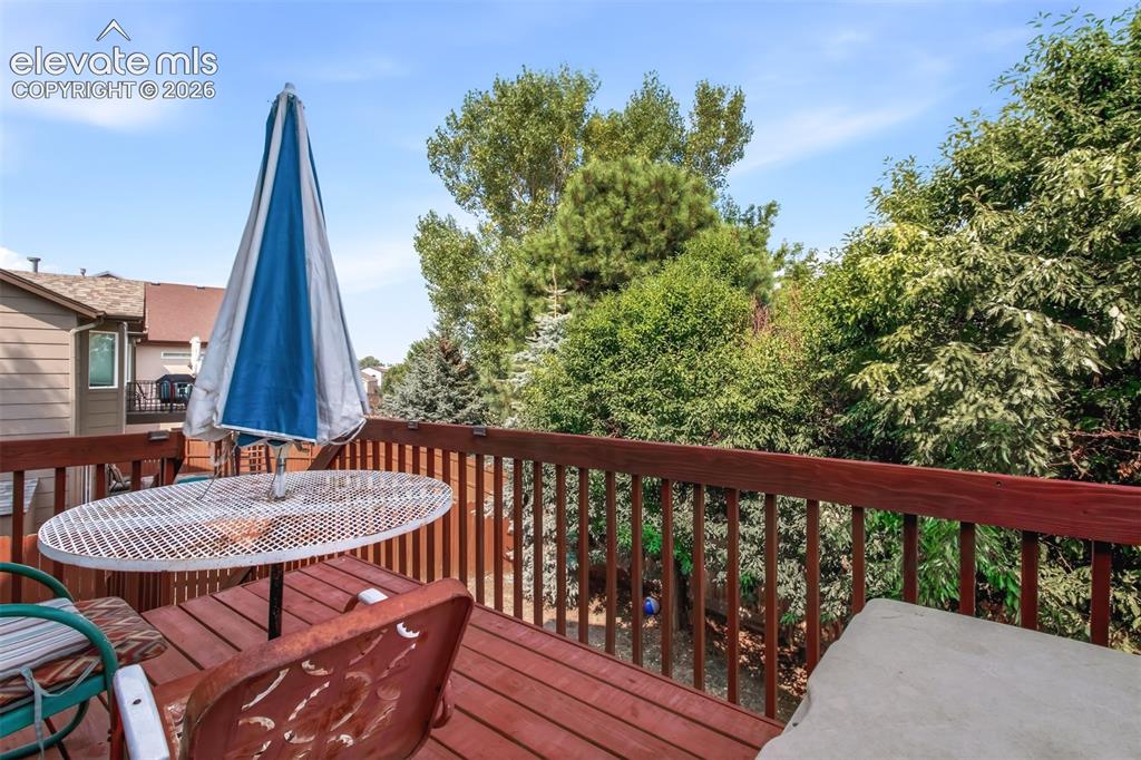 Image 12 of 41: Deck off Main Level Dining Area.