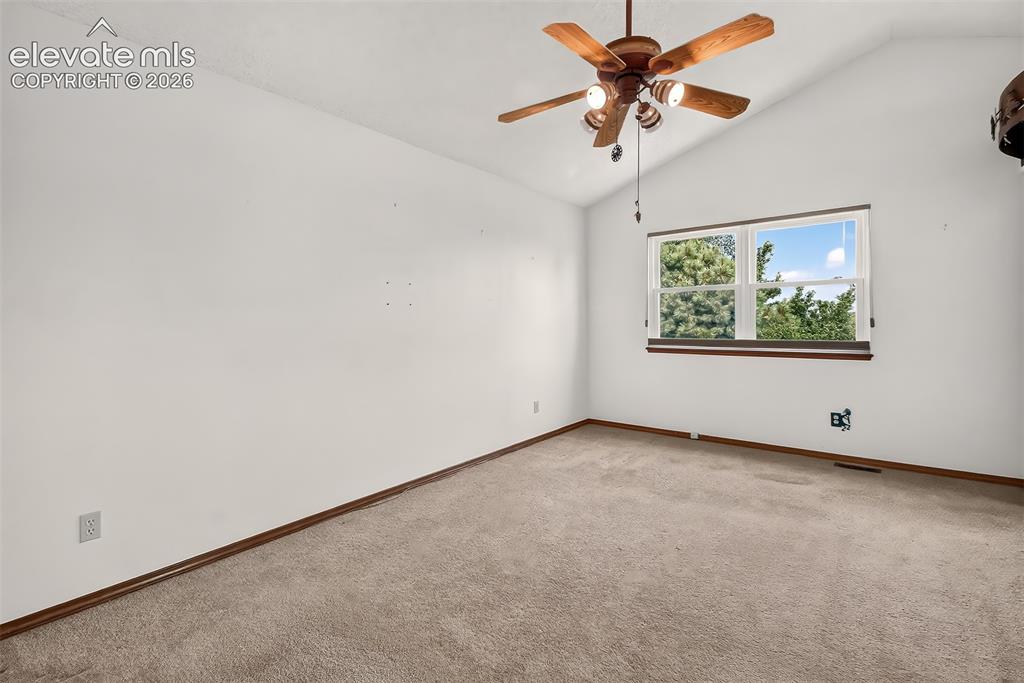 Image 16 of 41: Main Bedroom with view of the mountains