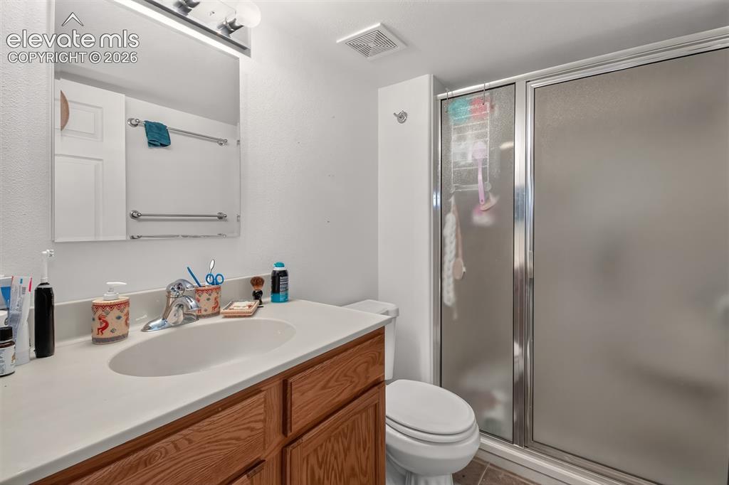 Image 29 of 41: Basement Three Piece Bathroom
