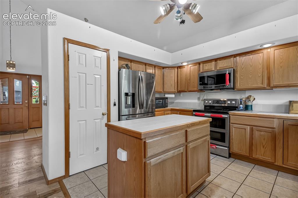 Image 7 of 41: Pantry and Prep Island