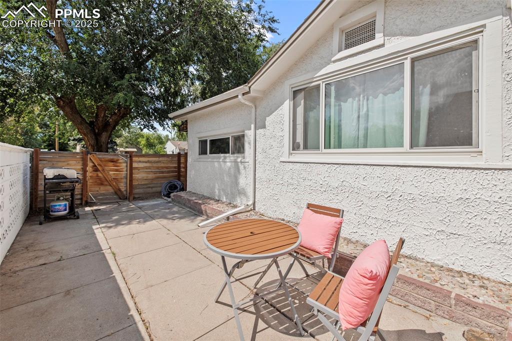 Image 23 of 27: View of patio / terrace with a gate