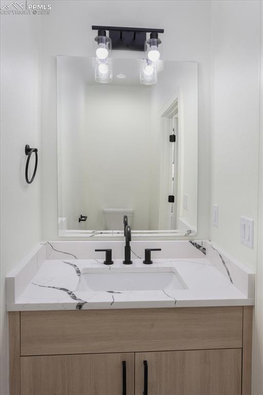 Image 12 of 30: Bathroom featuring vanity