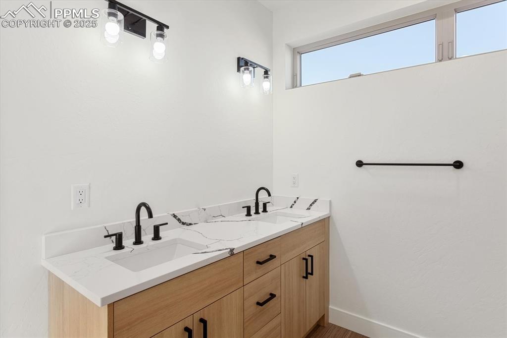 Image 18 of 30: Bathroom with vanity