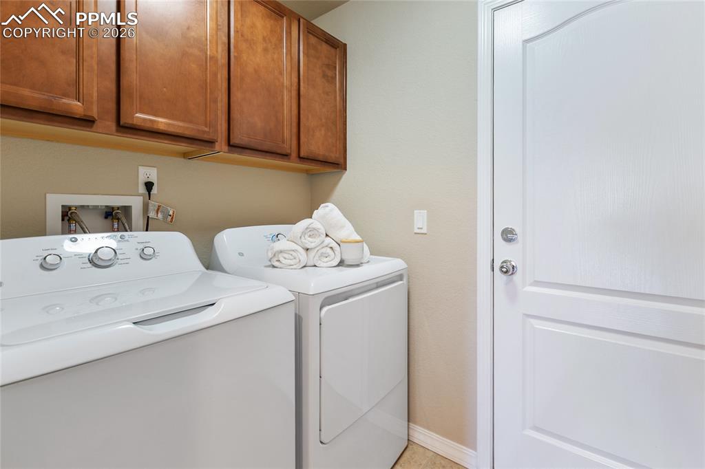 Image 16 of 27: Also on the main is the laundry area, so convenient!