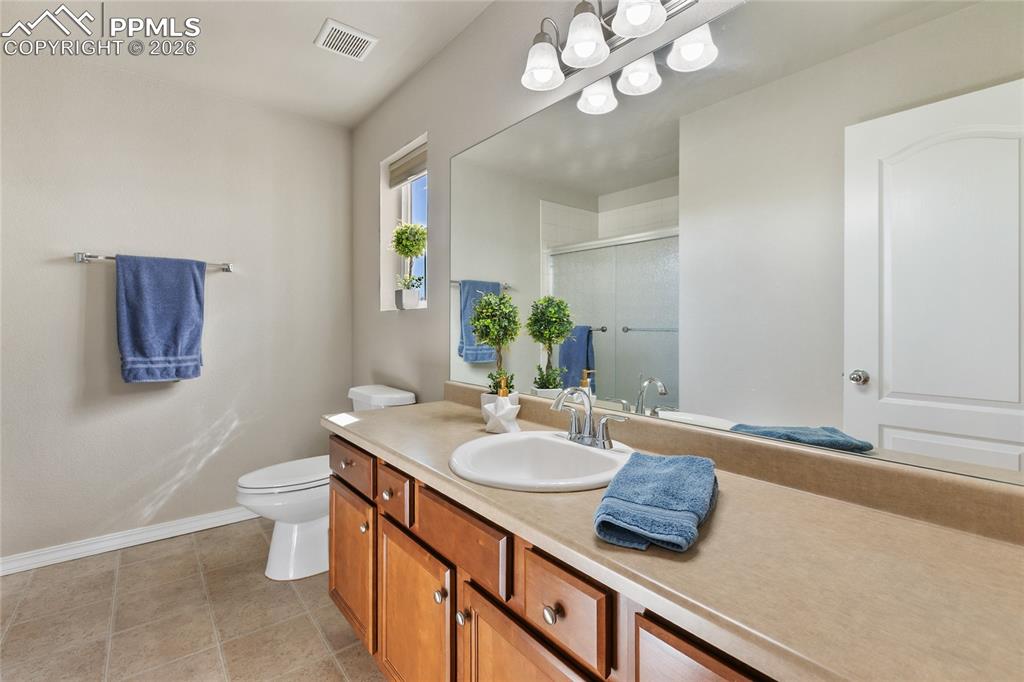 Image 20 of 27: There is also a wonderful full bathroom upstairs so you never have to share