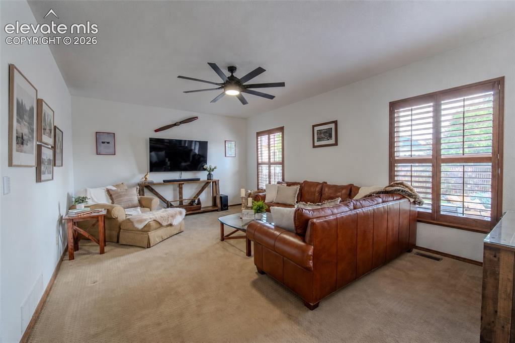 Image 19 of 44: Family room on Main floor off of kitchen