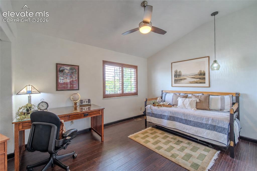 Image 39 of 44: Bedroom/office with french doors