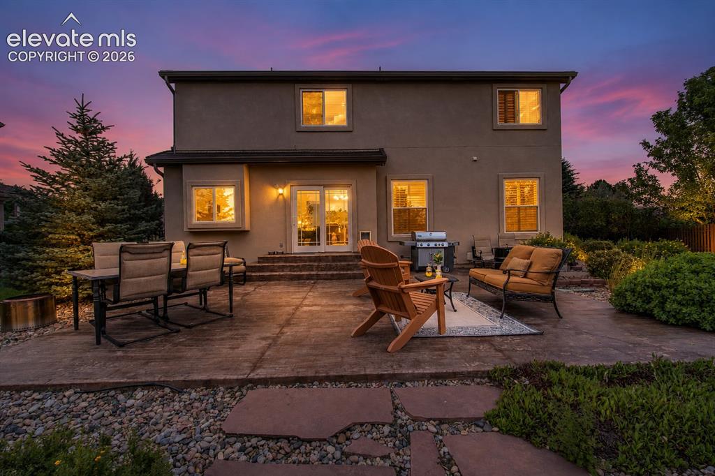 Image 8 of 44: Large rear patio- Stamped concrete