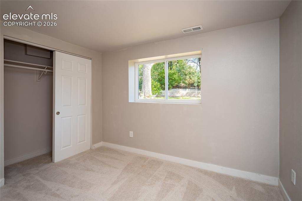 Image 14 of 25: 4th bedroom on lower level