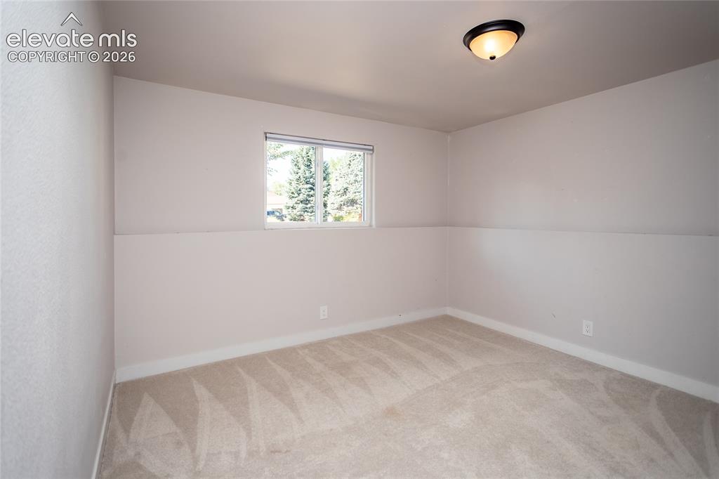 Image 17 of 25: 6th bedroom on lower level