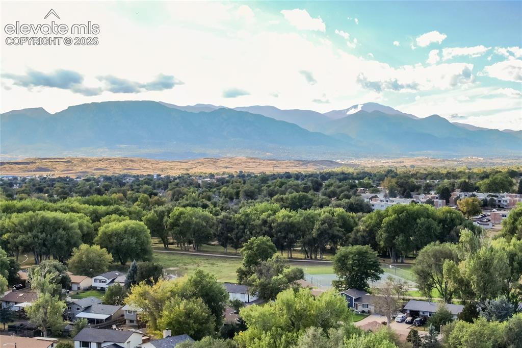 Image 24 of 25: Enjoy the mountain views from the street and the park that is just around t