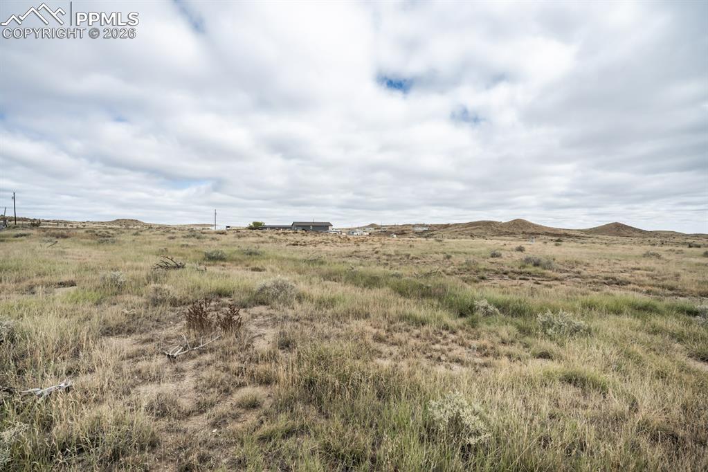 Image 6 of 13: View of undeveloped land with rural landscape
