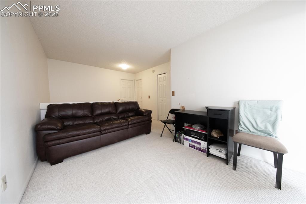 Image 19 of 19: upstairs loft space