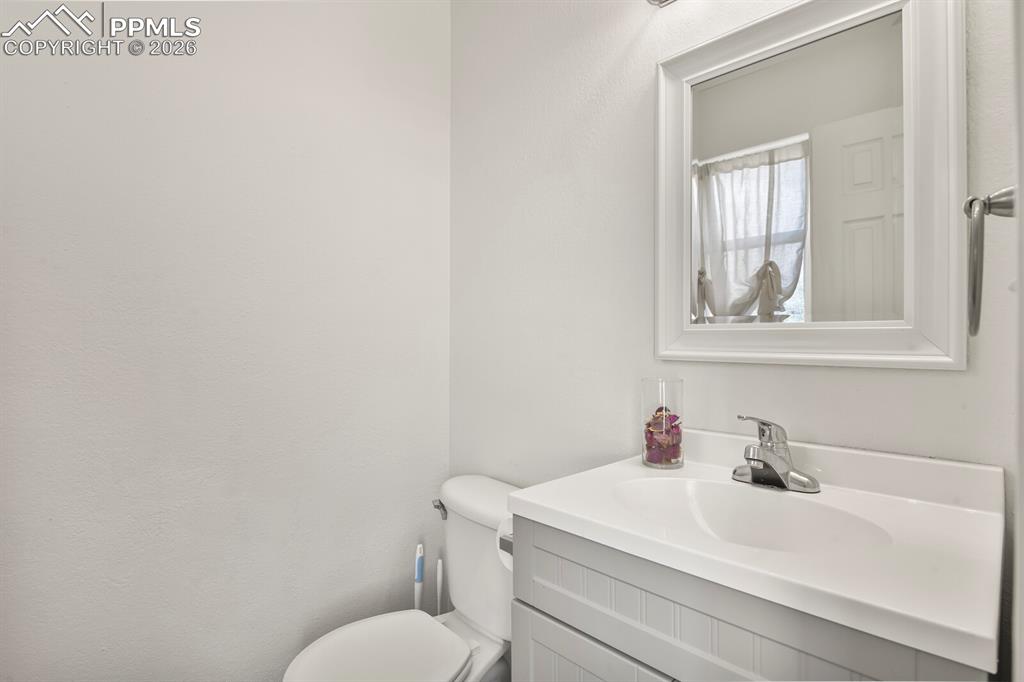 Image 11 of 26: Main level bathroom