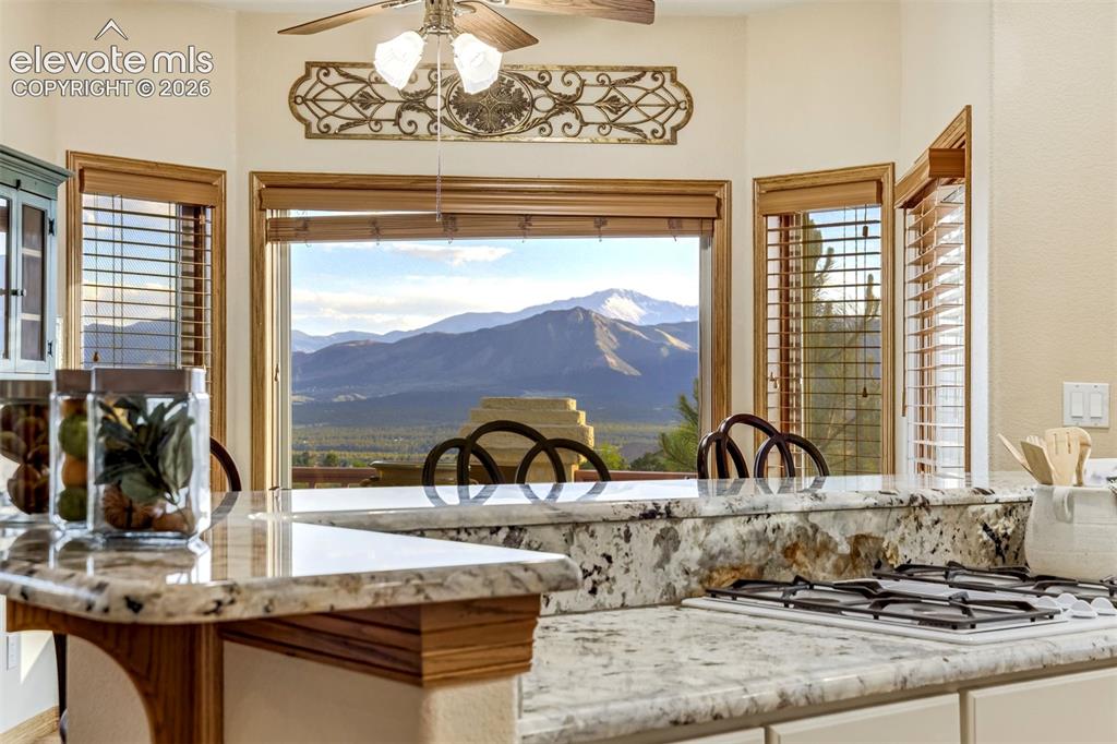 Image 10 of 49: Gorgeous granite counters and beautiful views