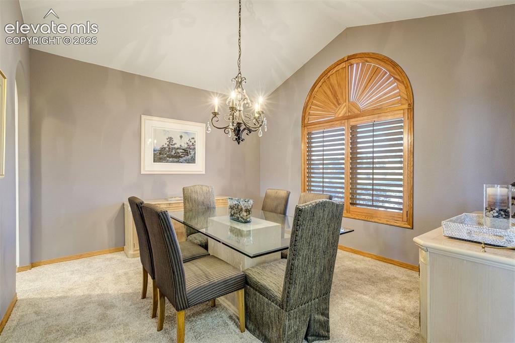 Image 15 of 49: Standing at door to entry way - Butler Pantry to the left