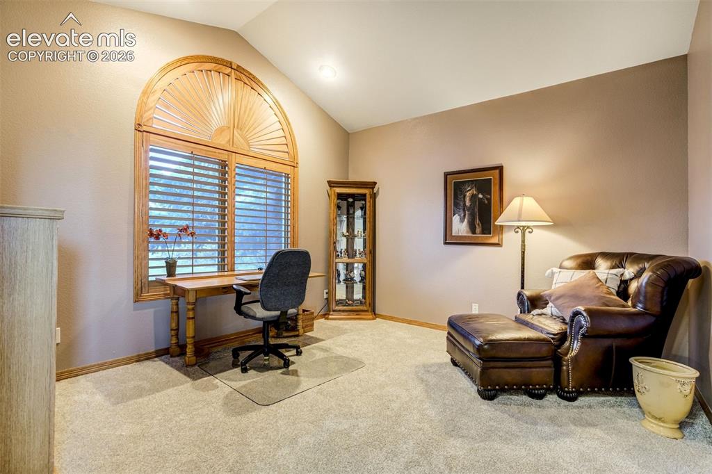 Image 24 of 49: A formal sitting room makes a great office
