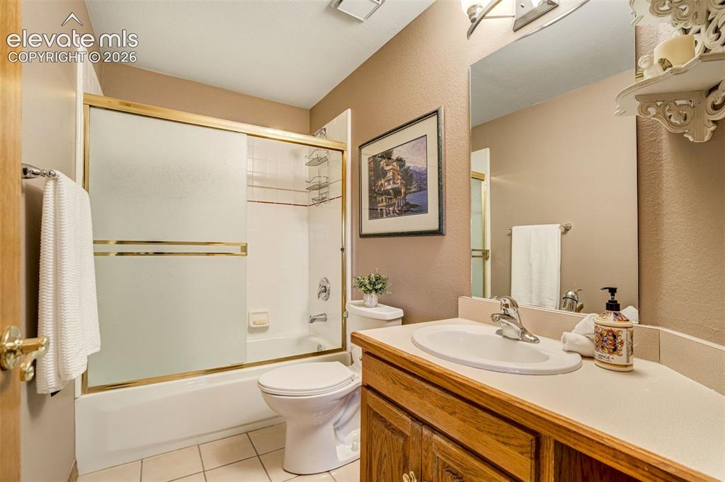 Image 26 of 49: A second full bathroom on the main level