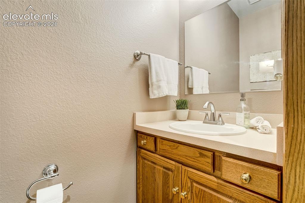 Image 30 of 49: Half bath conveniently located on the first floor