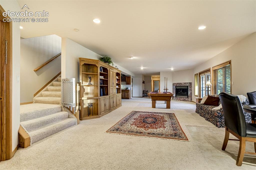 Image 31 of 49: The basement provides high ceilings and abundant natural light