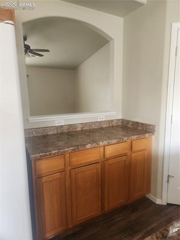 Image 10 of 24: Detailed view of wood finished floors and a ceiling fan