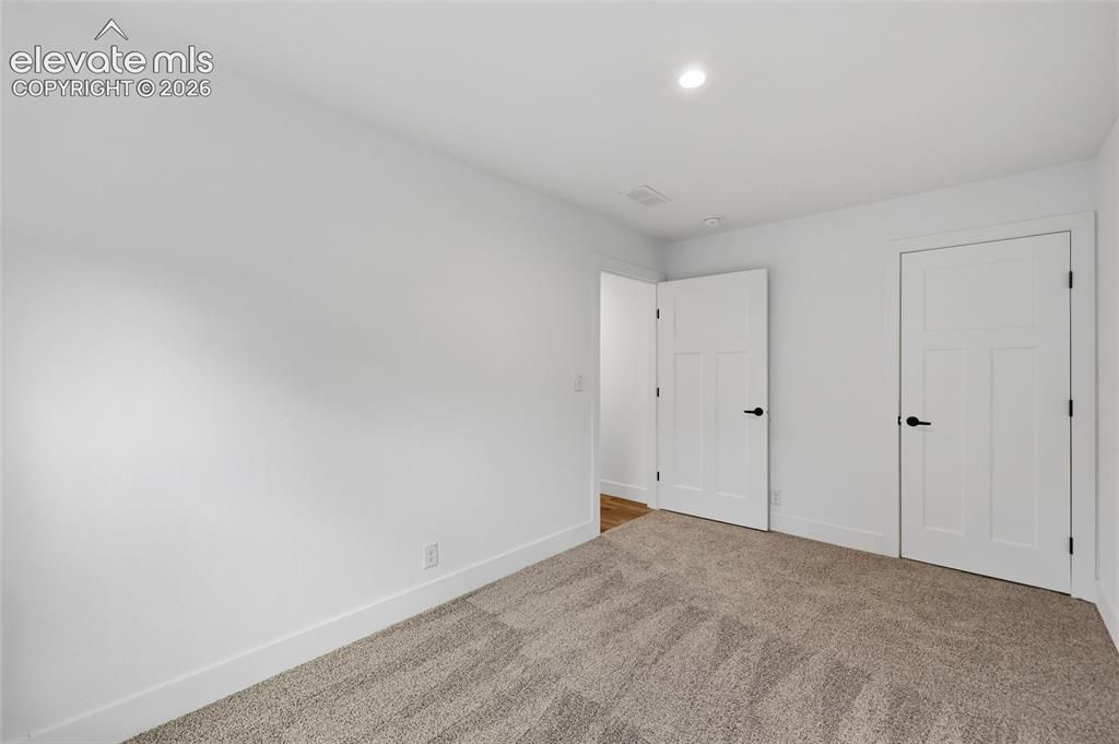 Image 14 of 28: Bedroom