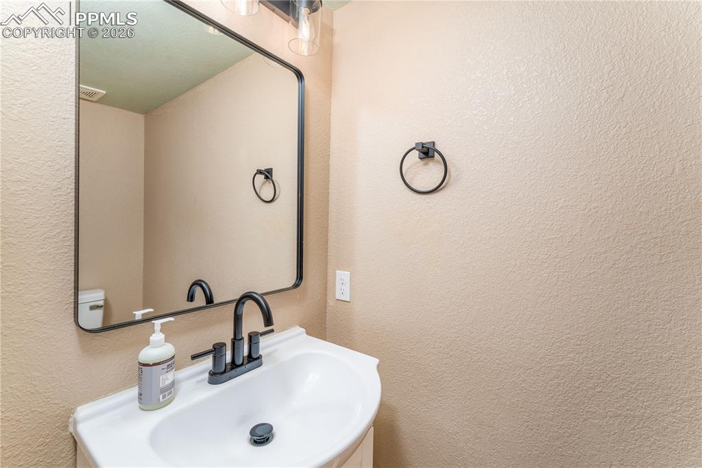 Image 8 of 44: Main Level 1/2 Bath