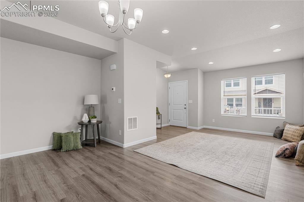 Image 12 of 26: The family room is the perfect place to rewind.