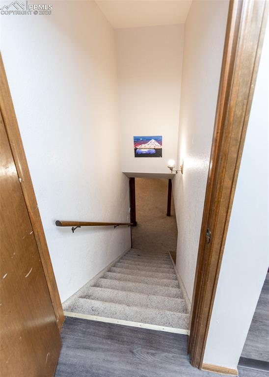 Image 21 of 47: Stairway to basement