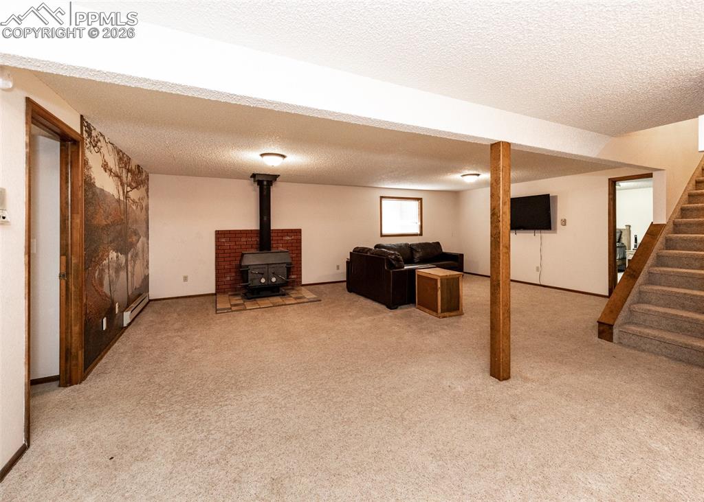 Image 26 of 47: Family room in basement