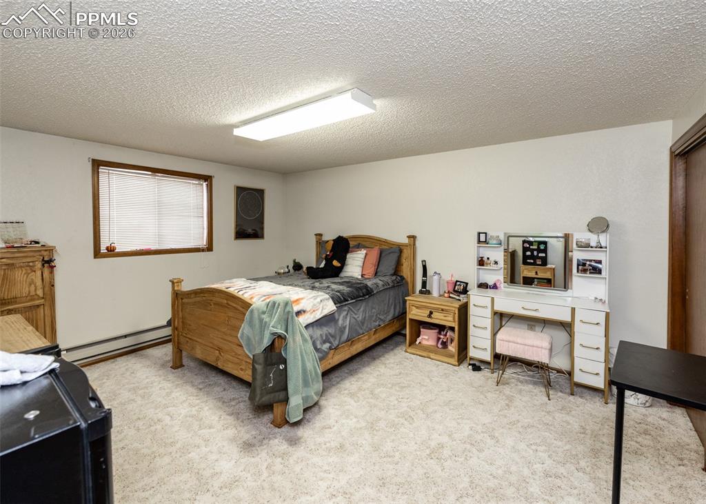 Image 29 of 47: 4th bedroom in basement