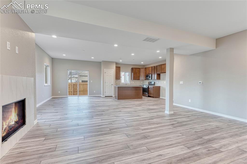 Image 6 of 34: Open floorplan fosters entertaining and spending time with loved ones.