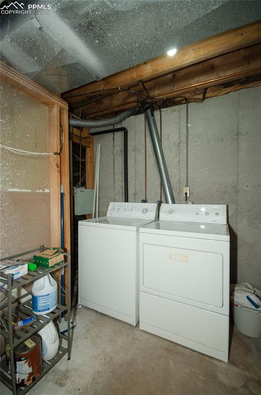 Image 33 of 49: Laundry in basement - 
Washer and Dryer "as is"