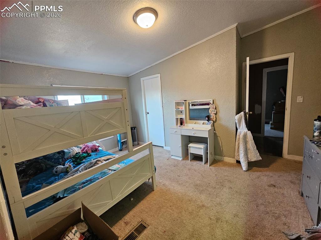 Image 20 of 28: Bedroom