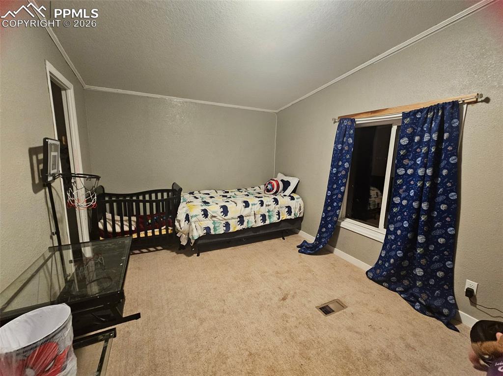 Image 26 of 28: Bedroom