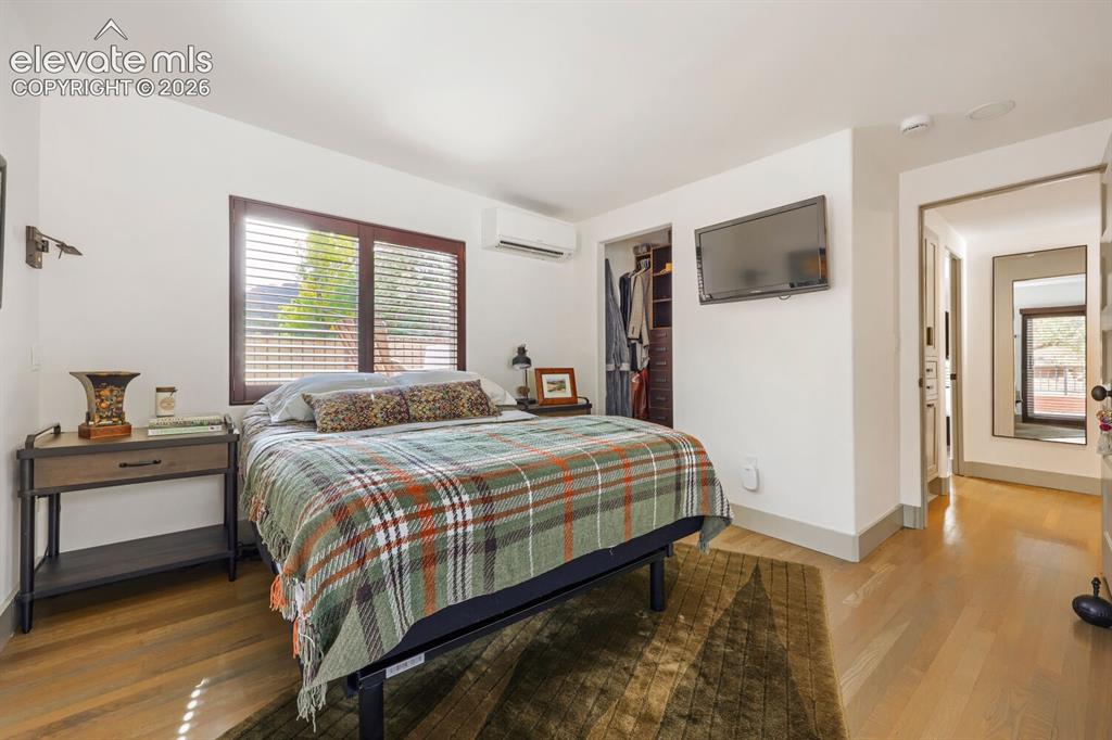 Image 19 of 30: Hardwood flooring, recessed lighting, built-in closet storage, mini-split c