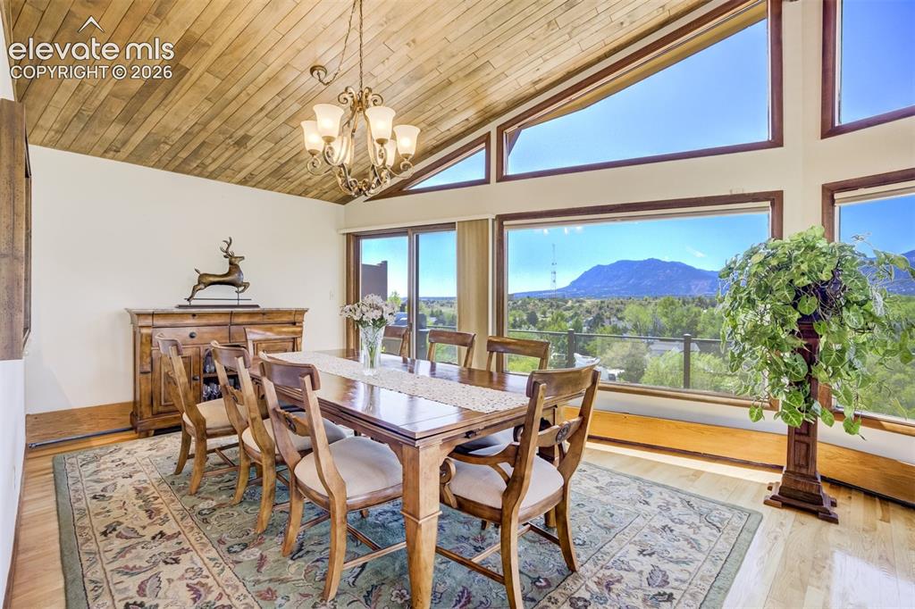 Image 11 of 50: Dining room with major views!!