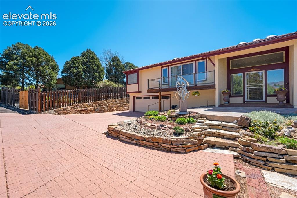 Image 45 of 50: Very welcoming and low maintenance landscaping.